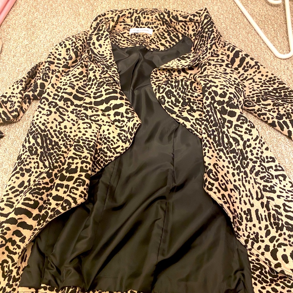 coat is awesome it’s a Calvin clown cheetah print